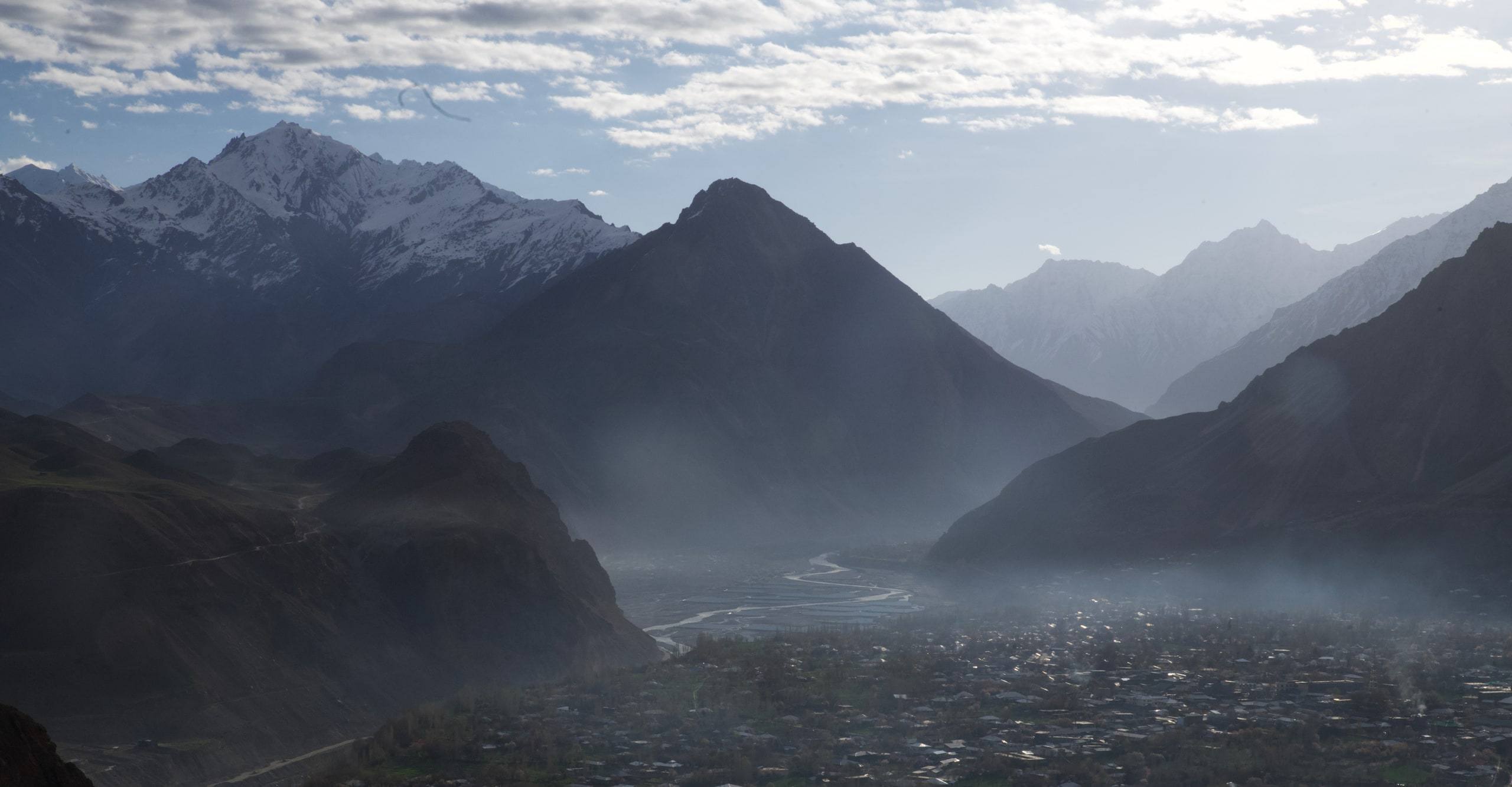 Cloud pouring over a Hindu Kush ridge above the Chitral Valley